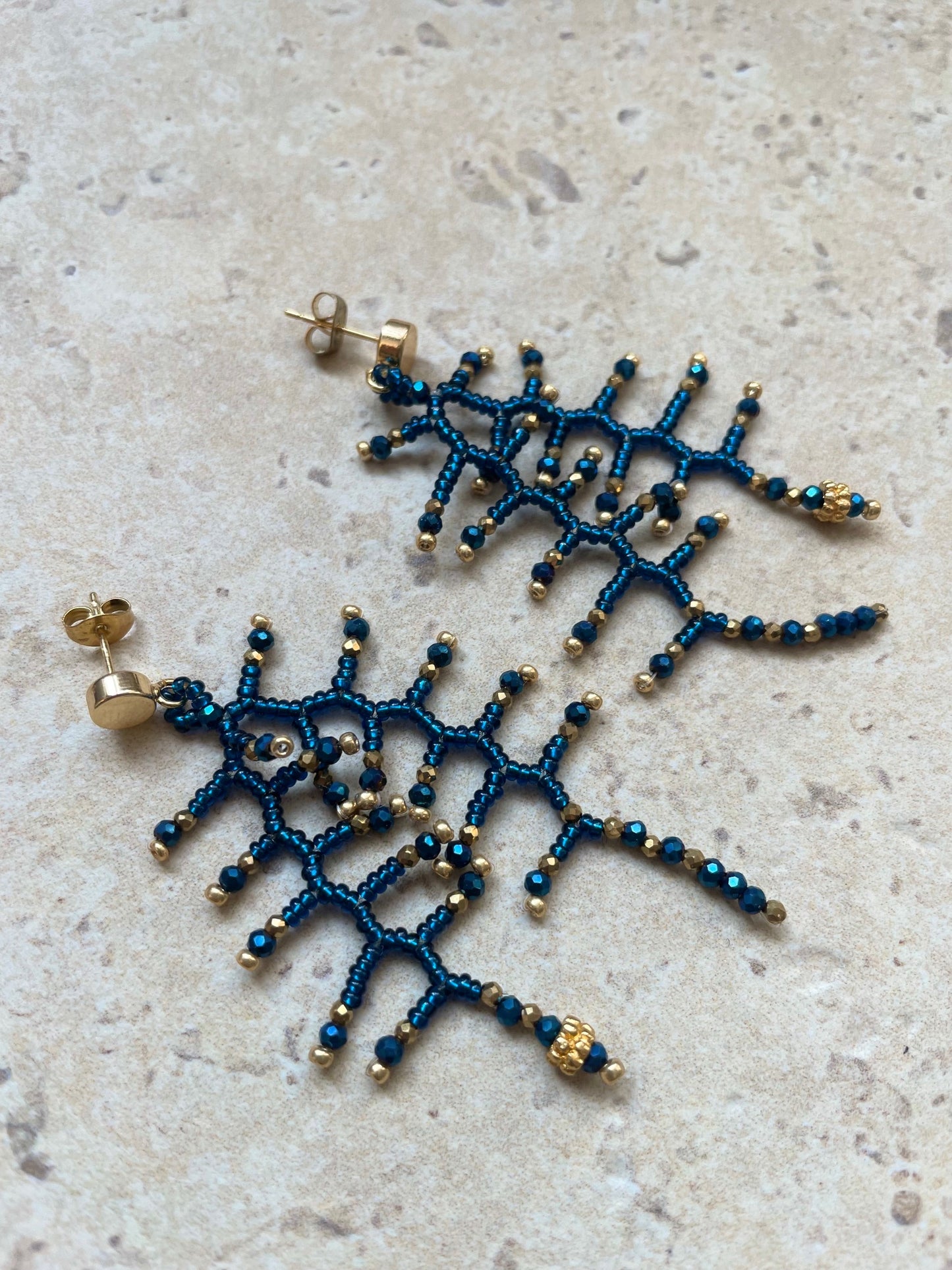 Glossy ocean blue with gold