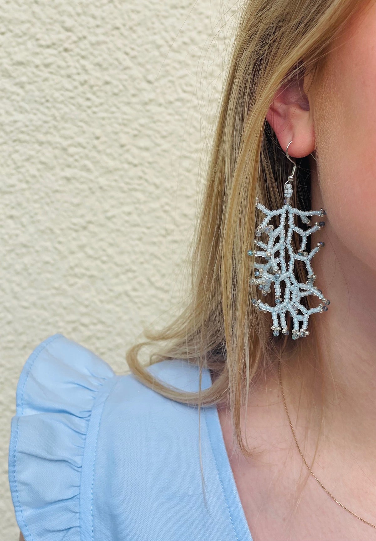 Glossy babyblue lined crystal