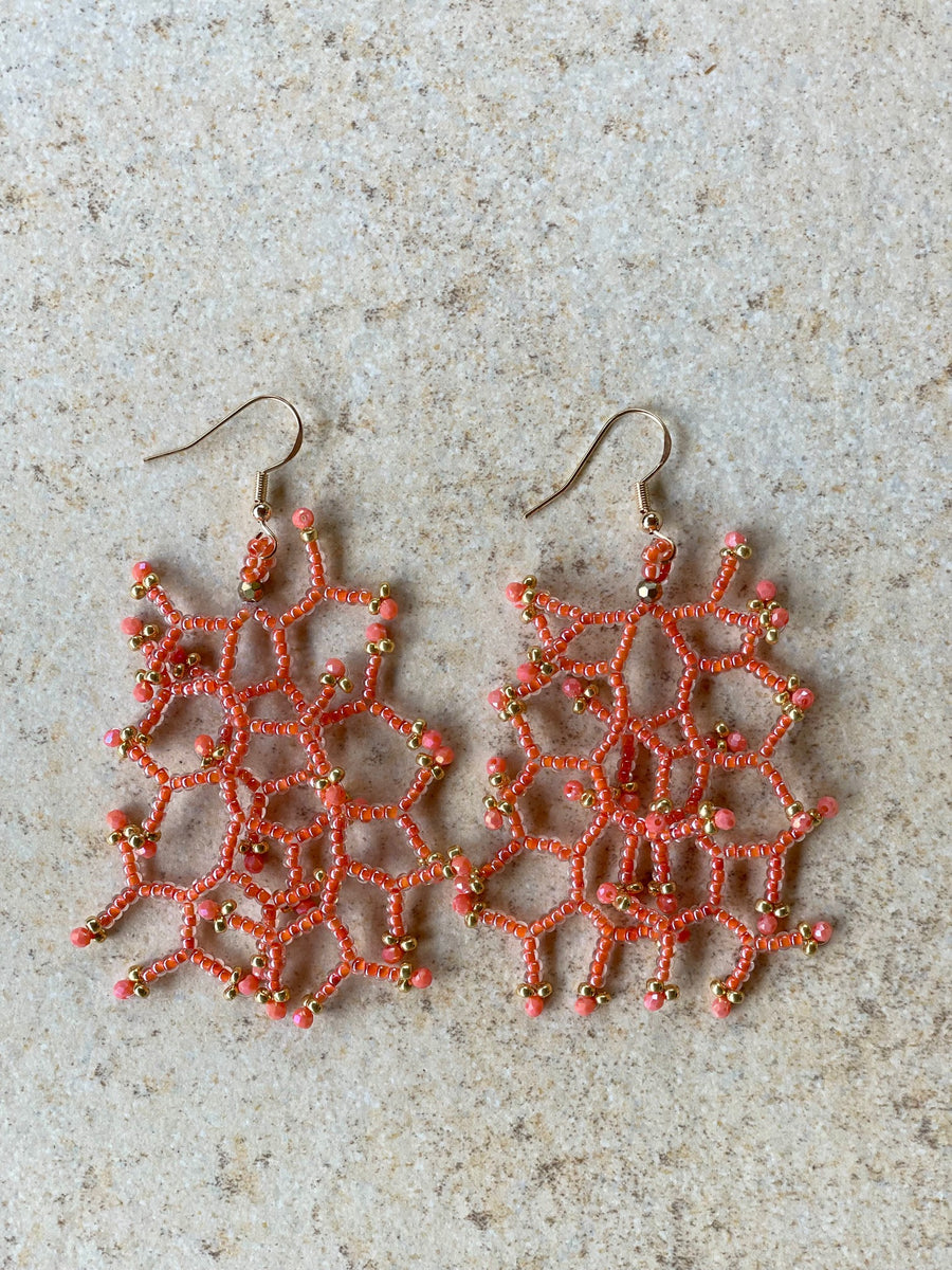 Glossy coral lined crystal