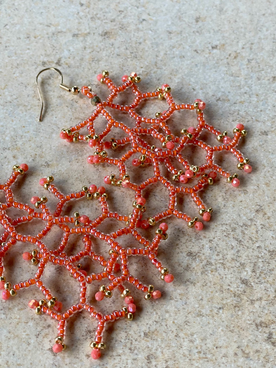 Glossy coral lined crystal
