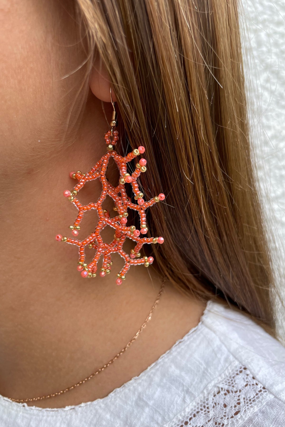 Glossy coral lined crystal