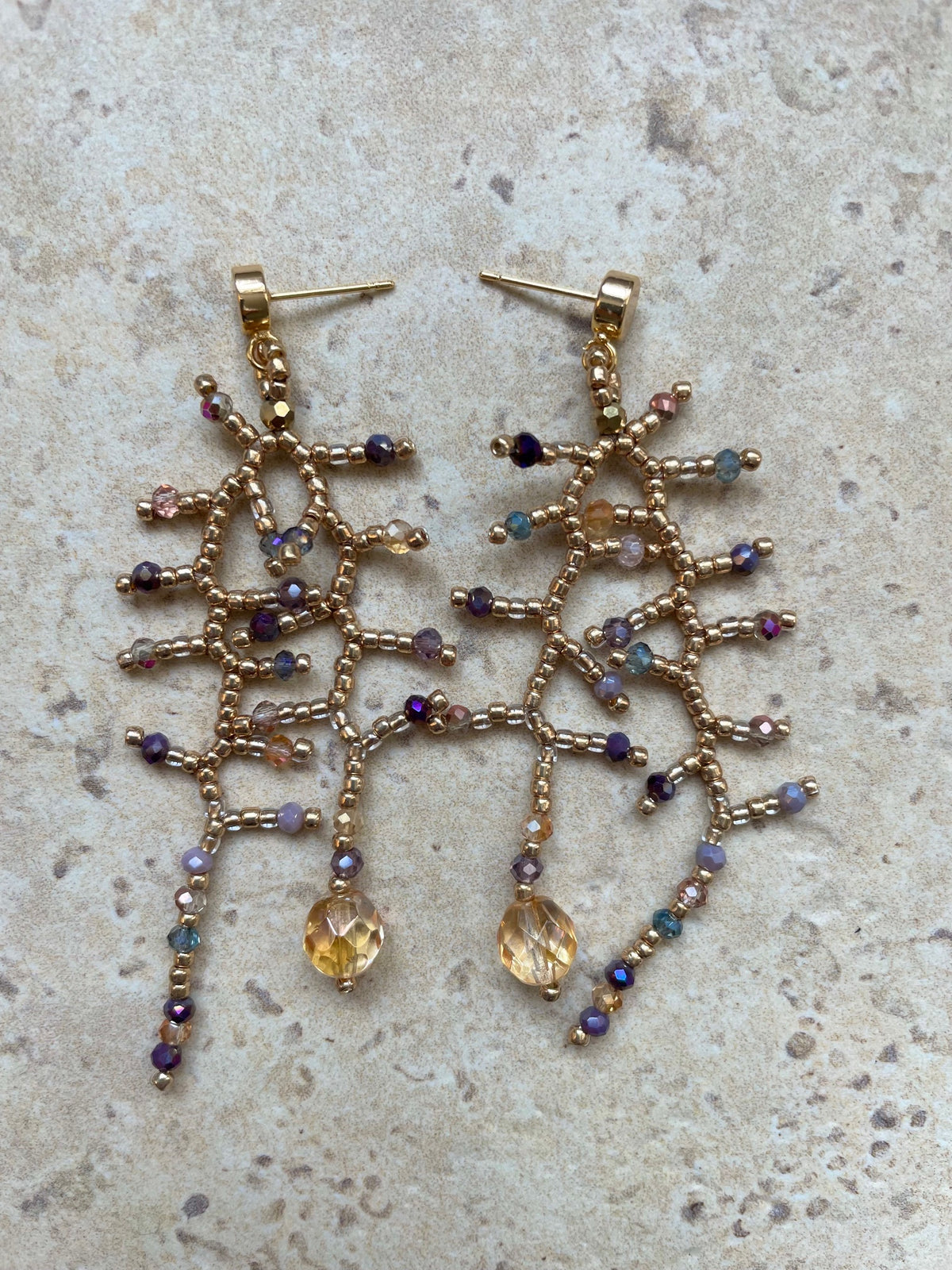Glossy gold with lilac