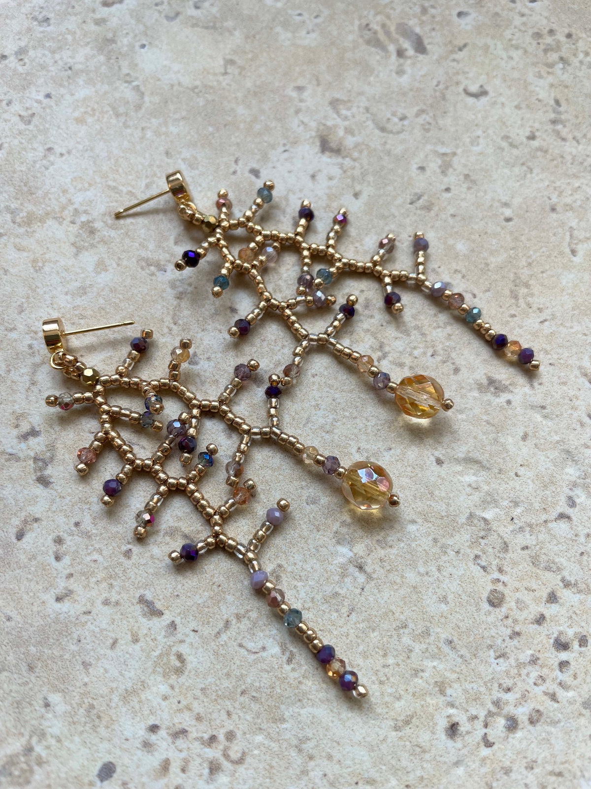 Glossy gold with lilac