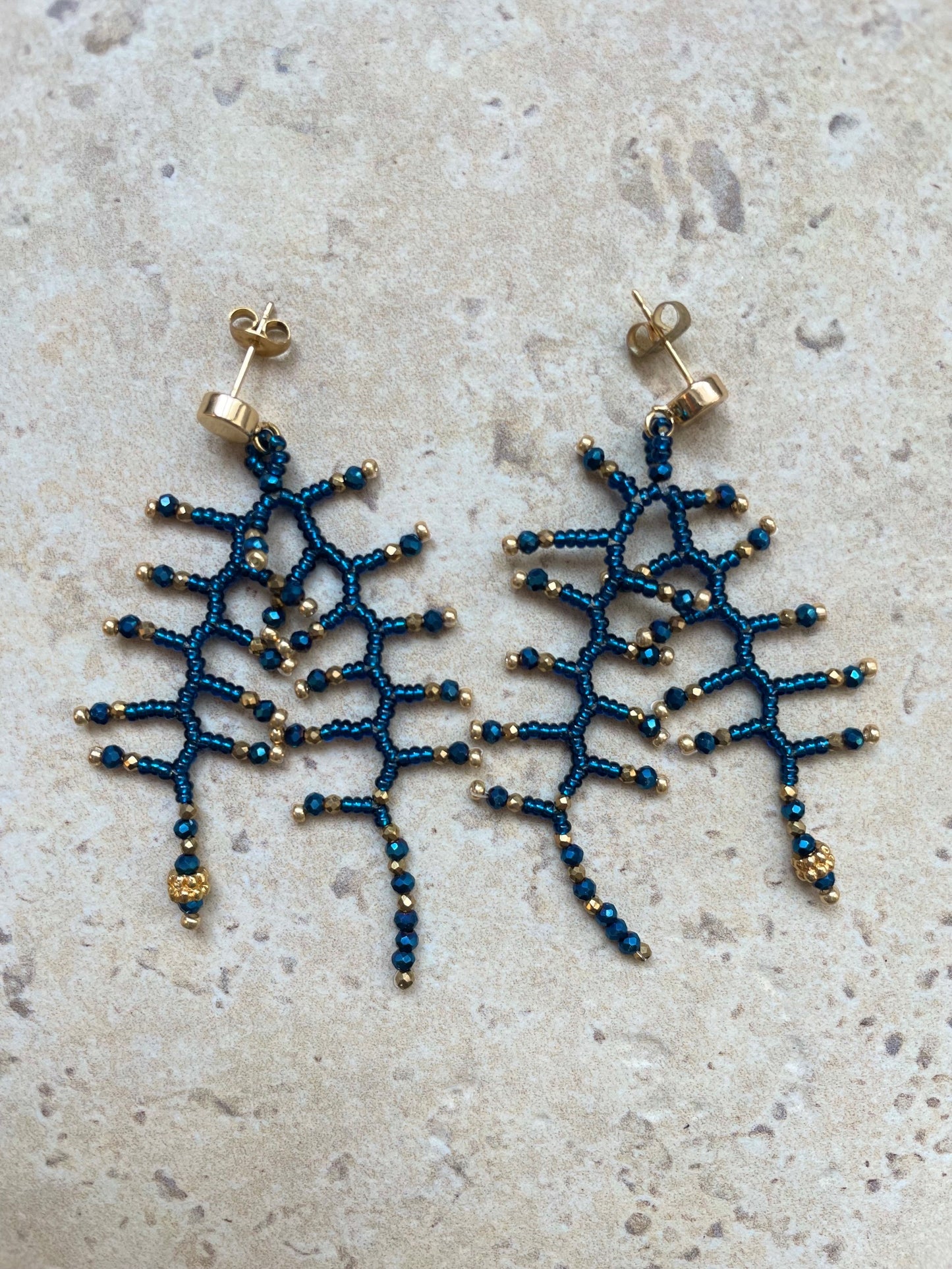 Glossy ocean blue with gold