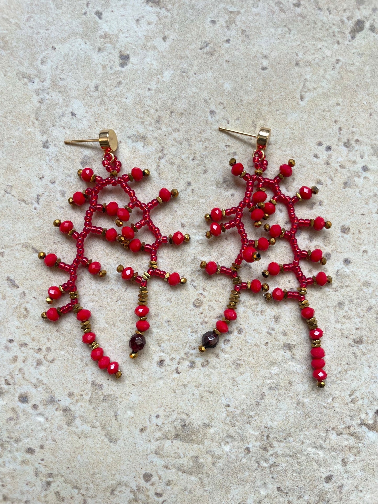 Glossy red siver lined with gold